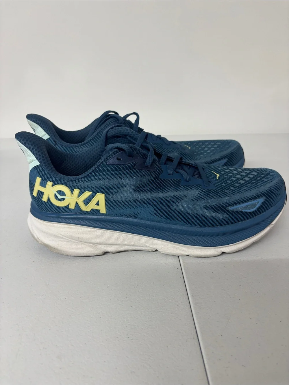 Hoka Blue Running Shoes with Yellow Logo